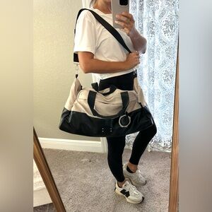 Bearpaw Women's Duffle Gym Bag Weekender Bag in black and tan color combination.